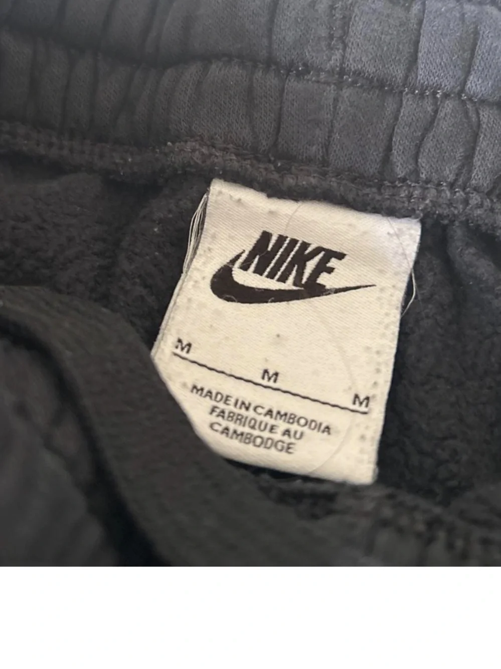 Nike Kids Black Jogger Sweatpants with White Swoosh
